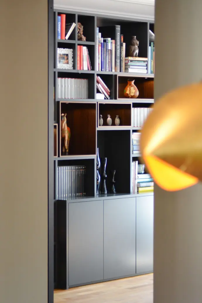 Detail of shelve in a home with books and decoration